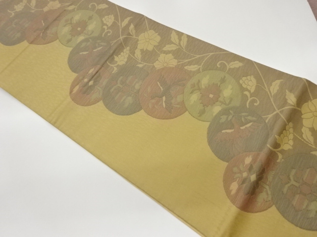 丸文に花喰い鳥・花唐草模様織出し袋帯